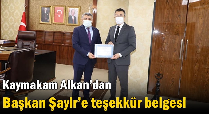 Kaymakam Alkan’dan Başkan Şayir’e teşekkür belgesi
