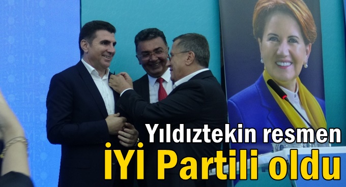 Gencay Yıldıztekin'e rozetini Türkkan taktı