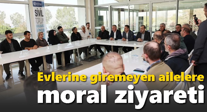 Evlerine giremeyen ailelere moral ziyareti