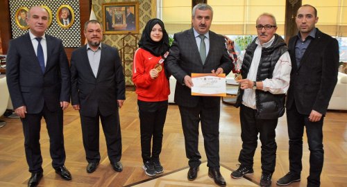 Başkan Baran şampiyonları ağırladı