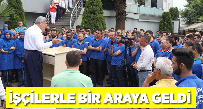 İşçilerle bir araya geldi