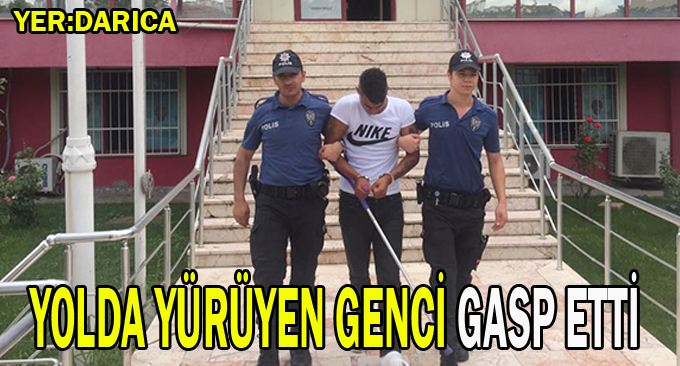 Yolda yürüyen genci gasp etti