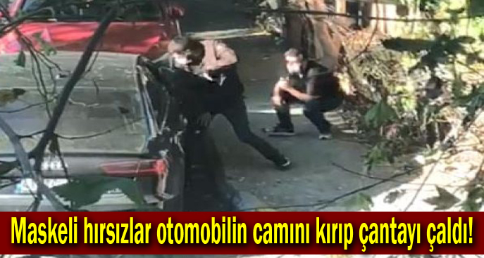 Maskeli hırsızlar otomobilin camını kırıp çantayı çaldı!