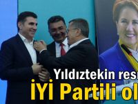 Gencay Yıldıztekin'e rozetini Türkkan taktı