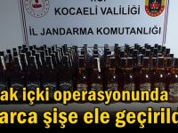 Kaçak içki operasyonunda onlarca şişe ele geçirildi!