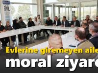 Evlerine giremeyen ailelere moral ziyareti
