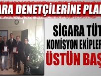 Sigara denetçilerine plaket