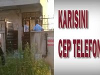 Karısını cep telefonuyla...