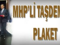 MHP'li Taşdemir'e plaket