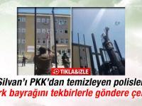 Polisler indirilen Türk bayrağını tekbirlerle göndere çekti İZLE