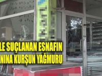 Tacizle suçlanan esnafın dükkanına kurşun yağmuru